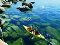 Kayaking is a great upper-body workout for skiers in the off-season and especially relaxing on the calm waters of Lake Tahoe, one of the clearest lakes in the world with water clarity of more than 70 feet. Credit: The Ritz-Carlton, Lake Tahoe