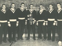 Bowdoin College ski team circa 1958 with state championship trophy.  John Christie is third from right.  He was originally a reluctant competitor. 
Credit: John Christie