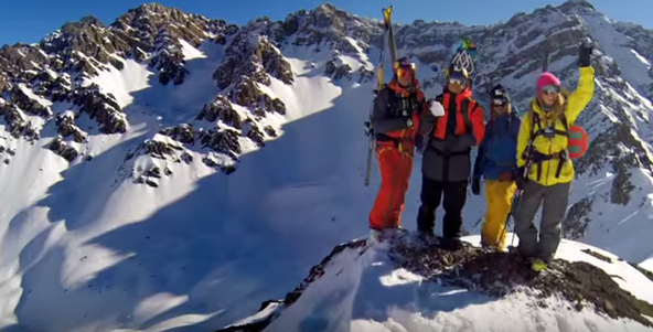 Four pro skiers at the tippy top of somewhere in the Andes. Credit: GoPro