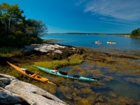 Dick Gilbane (rowing) and Kristen Roos (paddling) pass Little Ram Island in the Sheepscot River.
Credit: Tamsin Venn
