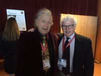 Ski legend Doug Pfeiffer and SeniorsSkiing.com co-publisher Mike Maginn reconnect after many decades at the ISHA Hall of Fame ceremony at Stowe.