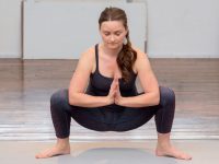 Malasana or garland pose is a squat sit that might be a good place to start.
Credit: REI