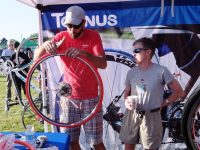 The dealer installs tubeless Tannus tires onto my rims before the big charity ride.
Credit: Harriet Wallis